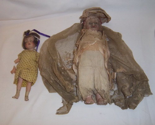 Sm. bisque head bride doll on composition body in hand-made silk clothing, & sm. bisque doll with