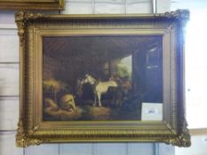 Gilt framed oil on canvas depicting a stable interior signed and dated by the artist "C.J. Cogman