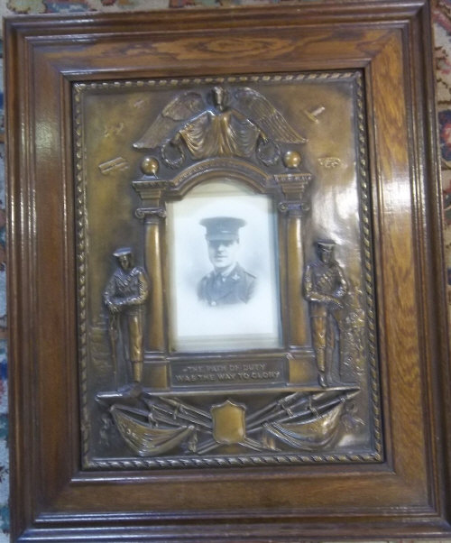 WWI framed commercially produced memorial plaque with cast decorative panel featuring a photograph