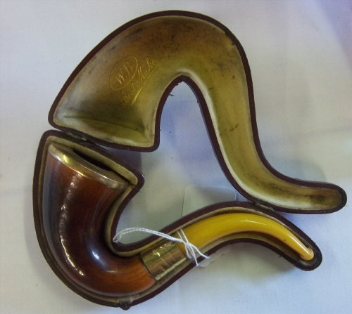 NOT AS CATALOGUED: Cased pipe with 18ct rolled gold rim and collar
