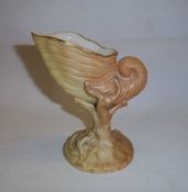Royal Worcester blush ware upturned nautillus shell supported on coral ht approx. 9.5cm