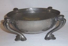 Pewter bowl with four fluted supports & scallop shaped pad feet in the Arts & Crafts style, the base
