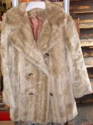 Ladies pale fur coat