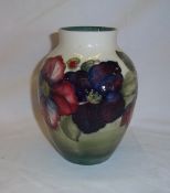 Moorcroft `Clematis` vase on white ground ht approx. 18cm
