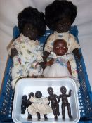 2 vinyl black dolls, sm. composition black doll & 6 miniature black dolls inc. a Kewpie