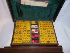 Mah jong set in leather case with bone markers & wooden tile holders