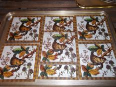 Set of 7 earthenware tiles with bird dec.