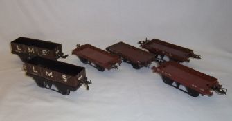 5 O gauge Hornby Meccano LMS tinplate flat wagons & 1 other