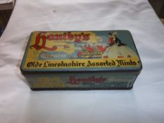 Jigsaw puzzle in `R. Houtby & Co. Lincoln` tin