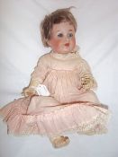 Bisque socket head doll (marked 201 Germany) with sleeping eyes, feathered eyebrows, detailed eye