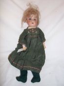 Armand Marseille bisque socket head doll (marked 390 A 1 M) with fixed eyes, feathered eyebrows,