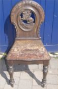 Oak hall chair with dec. carved splat