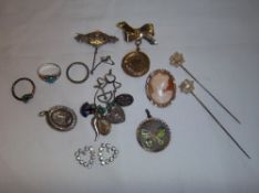 Silver locket, silver brooch, sel. silver charms etc.