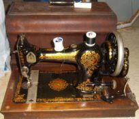 Cased Rushby sewing machine