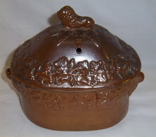 Salt glazed butter dish & lid with lion handles