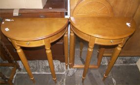 Pr. demi lune tables with matching mirror