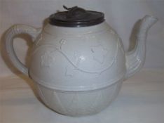 Stoneware teapot in white matt glaze with relief moulded ivy leaf dec. & pewter lid