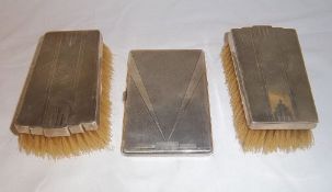 Silver cigarette case with pr silver backed hair brushes