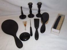 Ebony dressing table set inc. candlesticks, mirror, brush, shoe horn etc.