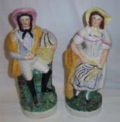 Pr of Staffordshire figures of fisherman & wife