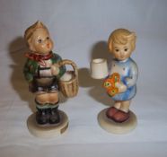 2 Hummel figurines 'Village Boy' and girl with nosegay incised 115 to base