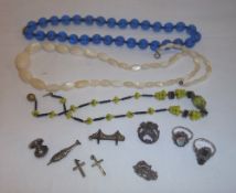 2 silver Art Deco rings, sel. charms, 2 silver crucifixes, 3 bead necklaces etc.