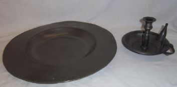 Broad rimmed pewter dish with touch marks to base of a rose and a rose and crown impressed in the