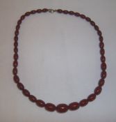 NOT AS CATALOGUED: Graduated cherry amber beads