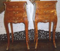 Pr Louis XVI side tables with 3 inlaid drawers & gilt metal mounts on sabre legs terminating in