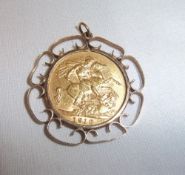 1910 gold full sovereign in 9ct gold mount