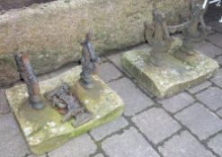 Pr wrought iron boot scrapers set in stone (1 damaged)