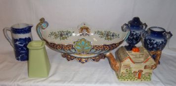 Lg. maiolica footed bowl with armorial crest dec. cottage teapot, pr blue & white vases, blue &