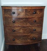 Vict. mah. bow fronted chest of drawers on turned feet