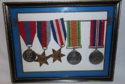 Framed set un-named medals