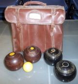 4 crown green bowls in leather carry case