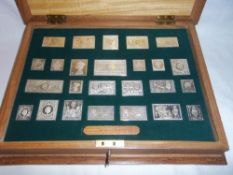 Cased set 25 silver postage stamps