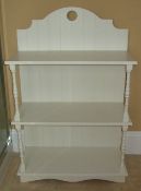 White painted bathroom shelves