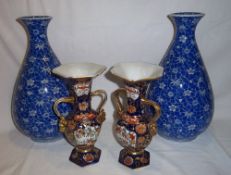 Pr lg. Oriental blue & white bottle vases & pr. Oriental two handled urn shaped vases with