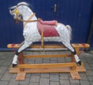 20th c. painted wood dapple grey rocking horse by Collinson with side glancing head