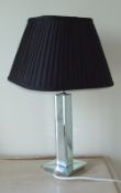 Table lamp with mirrored column base & modern wall mirror