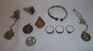 Silver locket on silver chain, 2 silver dress rings, 9ct gold ring, seal fob etc.