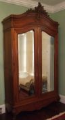 French double armoire with domed decorative cornice, carved dec. & bevelled mirror doors ht