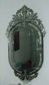 Venetian etched glass wall mirror with pierced foliate crest ht approx. 139cm