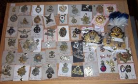 Lg. sel. British & US cloth & metal badges with lapel pins etc.