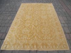 Chenille rug on yellow ground size approx. 163cm x 229cm