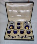 Royal Worcester cased set 6 teacups & saucers on blue ground with floral border & enamel dec. with 6