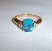 18K gold ring with (possibly) Boyaca Columbian emerald & diamond chip shoulders marked ILIANA