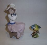 Beswick Blue Tit & Nao figurine of a seated girl cuddling a puppy