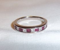 18K white gold half hoop eternity ring set with diamonds & rubies