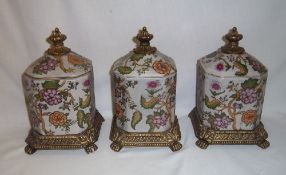 3 Oriental lidded pots with gilt metal effect mounts